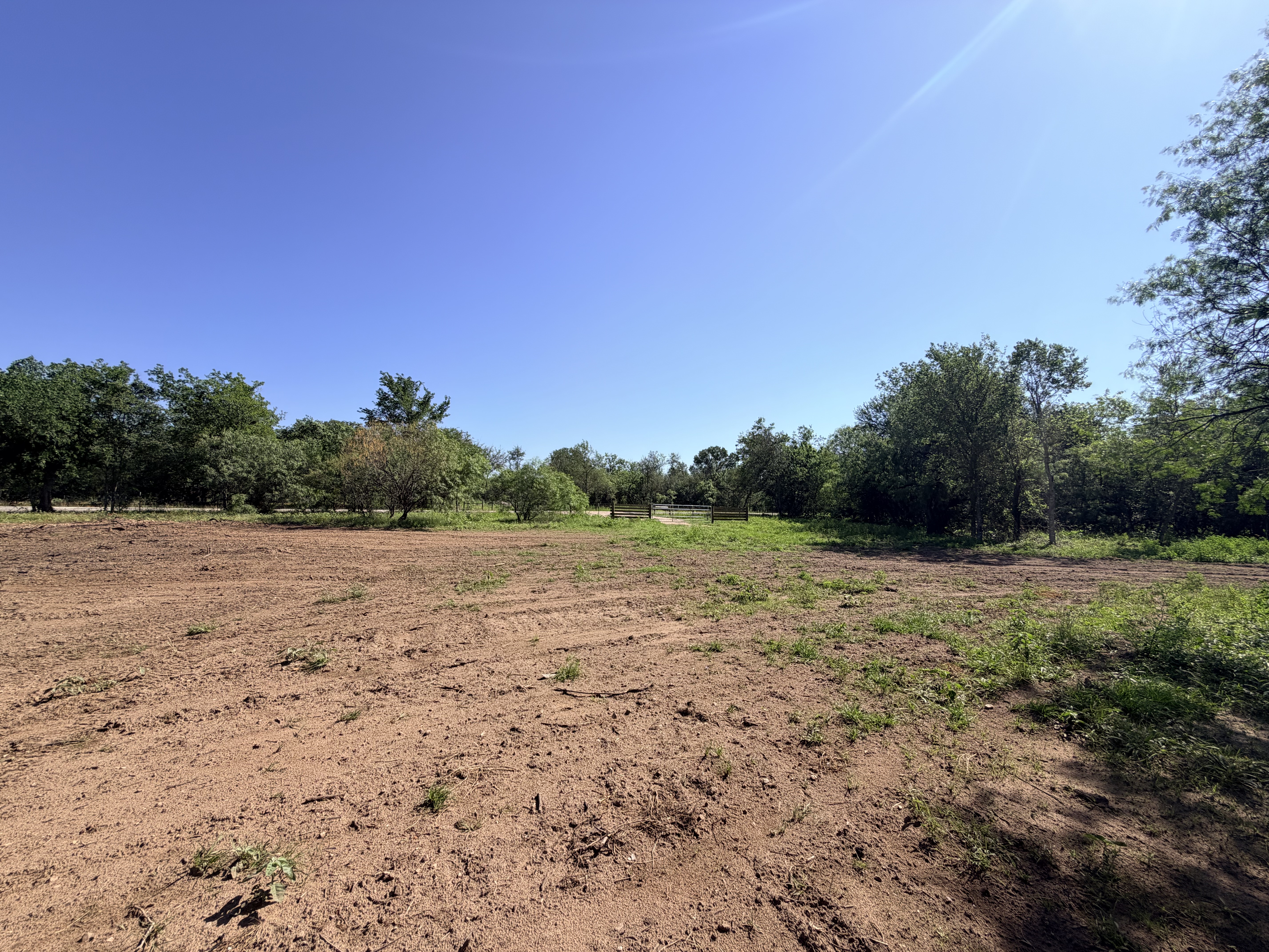 Discover a stunning piece of Central Texas landscape located in Luling, TX. This property offers over 12 acres of land, providing the perfect blend of country living and convenience. Enjoy the serene environment, just minutes from town, while experiencing true rural tranquility. The land boasts enormous shade trees and beautiful creek bottom terrain. Its gentle, sloping topography offers pristine views of the surrounding countryside, making it an ideal spot for those seeking scenic vistas. West Plum Creek runs along the backside of the property, adding to its natural appeal. The property features FM highway frontage, ensuring easy access. Several prime building sites are ready for development, with new fencing and electricity already installed. These improvements make the land immediately usable for various purposes. Situated within 5 minutes of Luling and just 10 minutes from Lockhart, this property provides quick access to nearby towns. It is less than an hour from both Austin and San Antonio, and only about 45 minutes from the Austin International Airport and Circuit of the Americas racetrack. 
NO RESTRICTIONS
AG EXEMPT - WILDLIFE